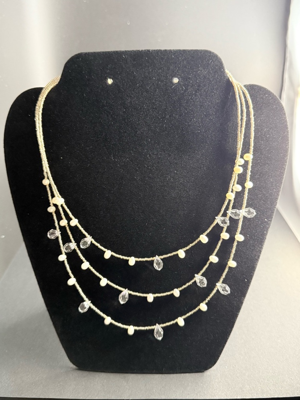 Multi-Strand Gold Tone Necklace with Clear Crystal and Pearl Accents